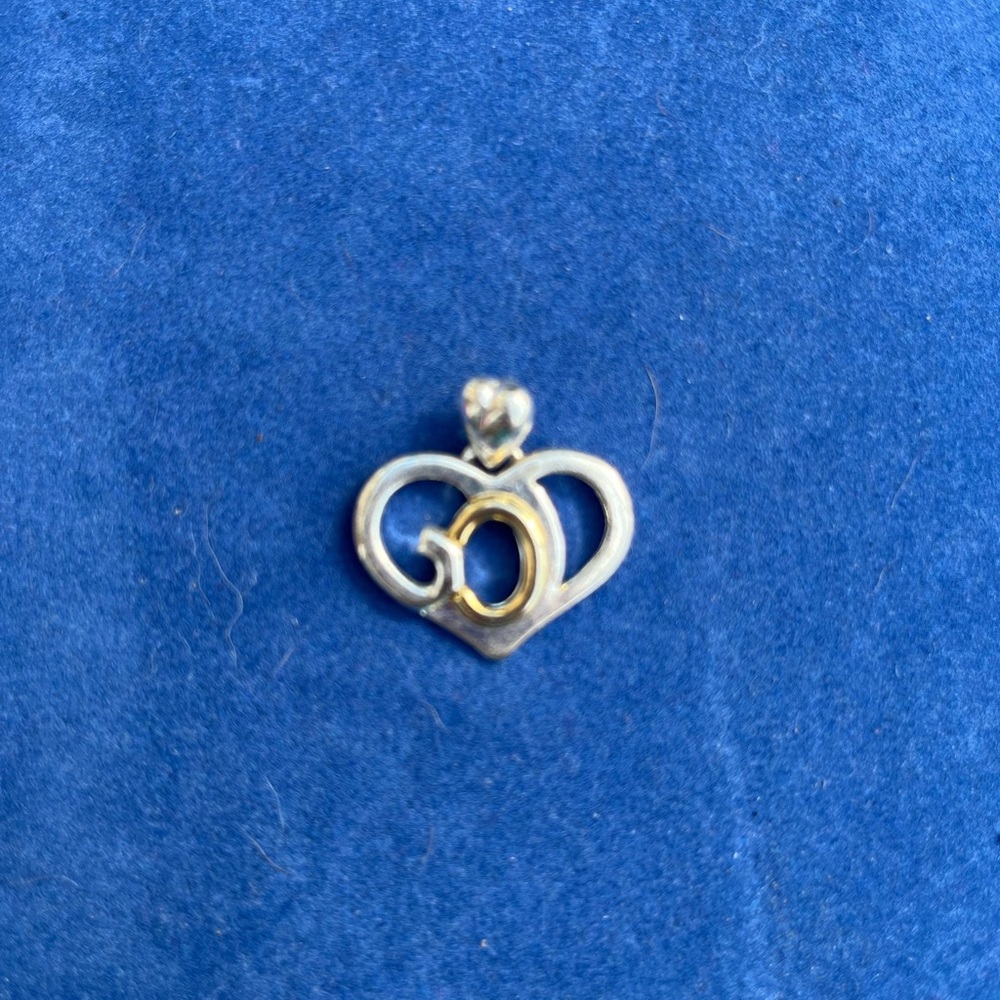 Silver and 18k gold God pendant